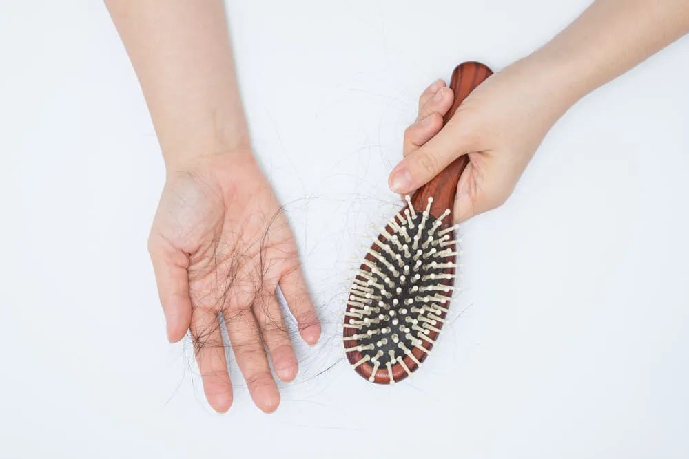 Hair Fall In Women: Causes, Home Remedies, Prevention